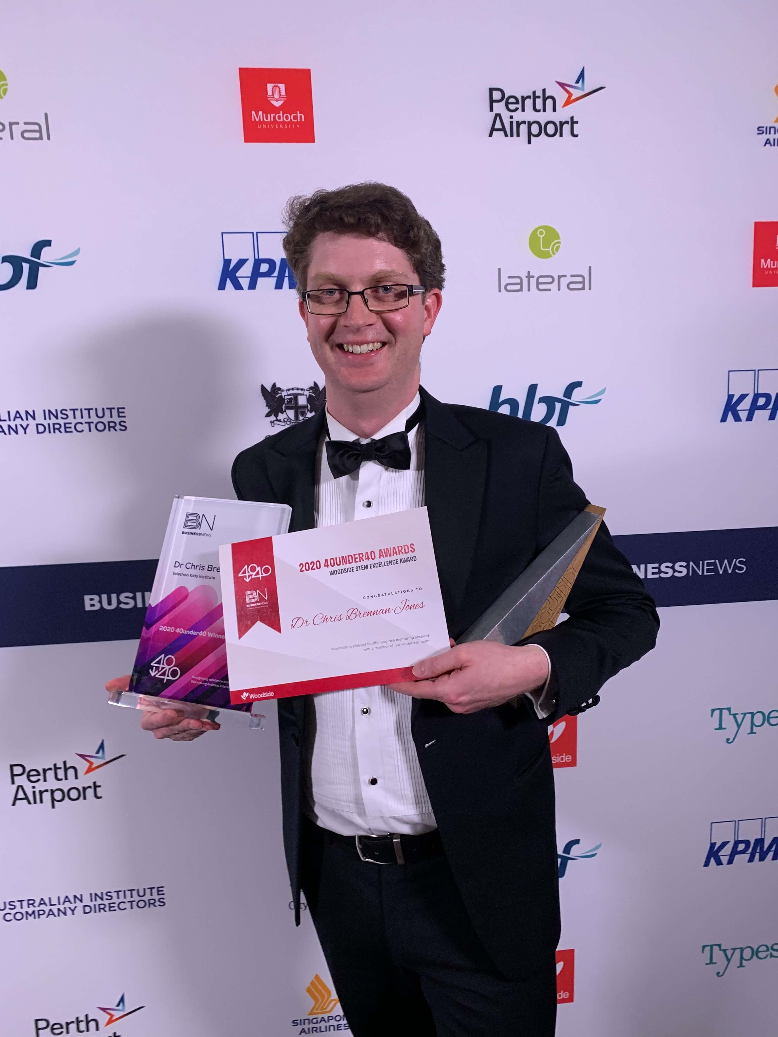 Chris with awards Chris with awards
